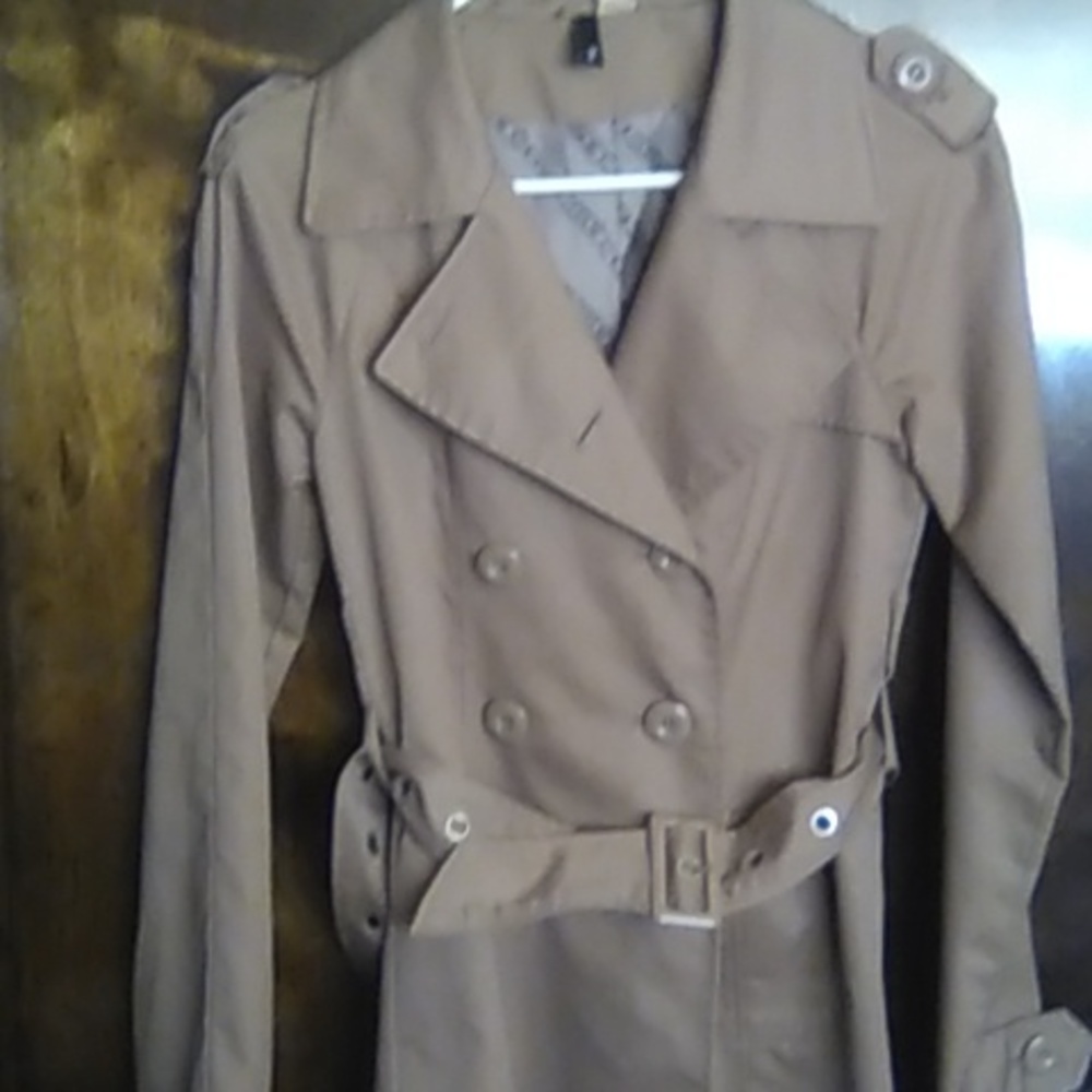 Gently used winter coat. Macy's brand, size 2, light brown. Excellent conditions